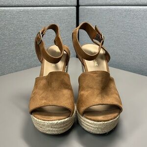 Sun + Stone brown sandal with woven 4 1/2 inch heel, size 8. Worn once!